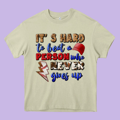 It's Hard To Beat A Person Who Never Gives Up Heavy Core Tee Designed By Bundleandbundleshop