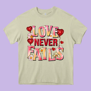 Love Never Fails Heavy Core Tee Designed By Fadigitalartstudio
