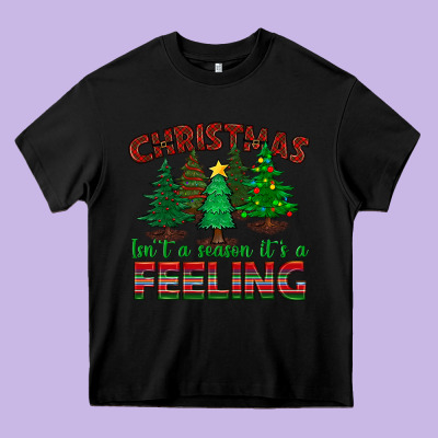 Christmas Isn't A Season It's A Feeling Heavy Core Tee Designed By Bundleandbundleshop