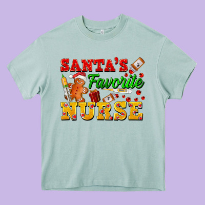 Santa's Favorite Nurse Heavy Core Tee Designed By Fadigitalartstudio