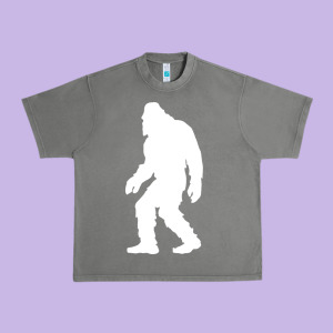 Bigfoot Walking Silhouette Urban Heavy Tee Designed By Artisfamous