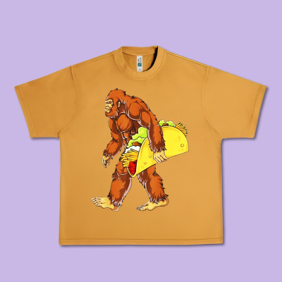 Bigfoot Carrying Taco Urban Heavy Tee Designed By Artisfamous