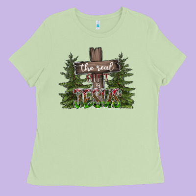 The Real Gift Is Jesus Ladies Tee Designed By Cowhidedigitalart