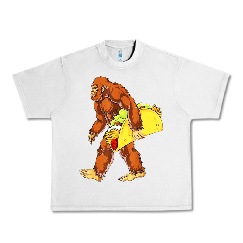 Bigfoot Carrying Taco Urban Heavy Tee by DesigneFamous | Teevron