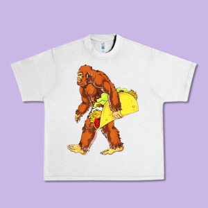 Bigfoot Carrying Taco Urban Heavy Tee Designed By Designefamous