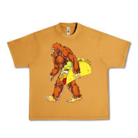 Peanut Butter bigfoot carrying taco Urban Heavy Tee - DesigneFamous