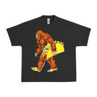 Pigment Black bigfoot carrying taco Urban Heavy Tee - DesigneFamous