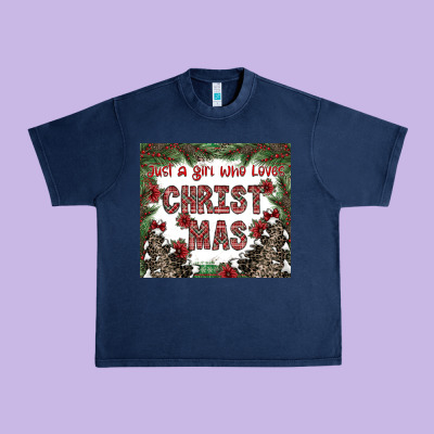 Just A Girl Who Loves Christmas Urban Heavy Tee Designed By Cowhidedigitalart