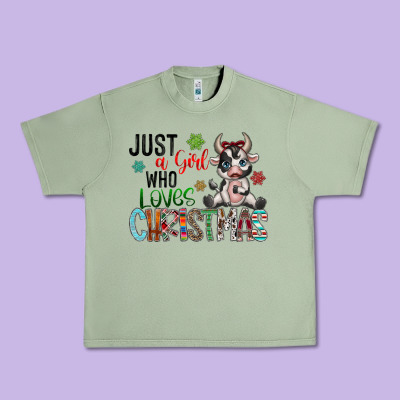 Just A Girl Who Loves Christmas Urban Heavy Tee Designed By Cowhidedigitalart