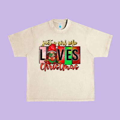 Just A Girl Who Loves Christmas Urban Heavy Tee Designed By Cowhidedigitalart