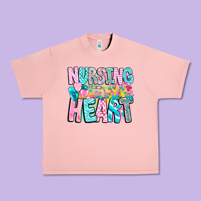 Nursing Is A Work Of Heart Urban Heavy Tee Designed By Cowhidedigitalart