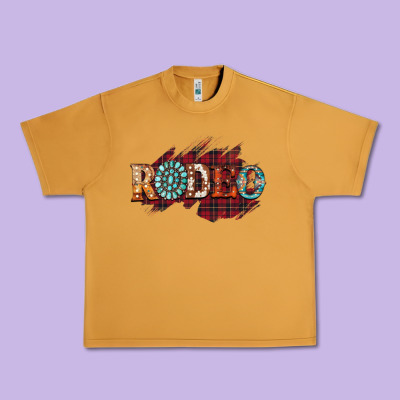 Rodeo Christmas Urban Heavy Tee Designed By Cowhidedigitalart