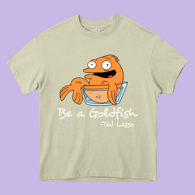 Be A Goldfish Ted Losso Heavy Core Tee Designed By Artisfamous