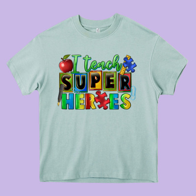 I Teach Super Heroes Heavy Core Tee Designed By Fadigitalartstudio