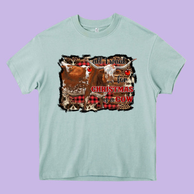 All I Want For Christmas Is A Cow Heavy Core Tee Designed By Ranaportraitstore