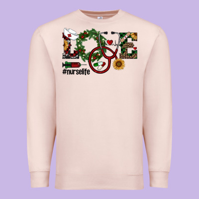 Christmas Love Nurselife Premium Sweatshirt Designed By Ranaportraitstore
