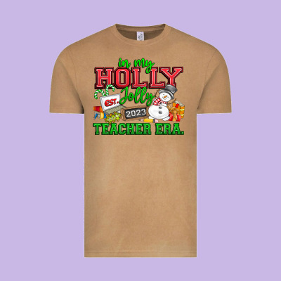 In My Holly Jolly Teacher Era Vintage Tee Designed By Cowhidedigitalart