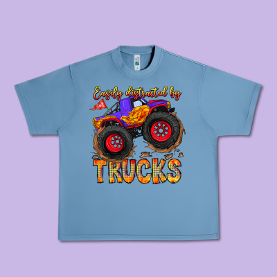 Easily Distracted By Trucks Urban Heavy Tee Designed By Cowhidedigitalart