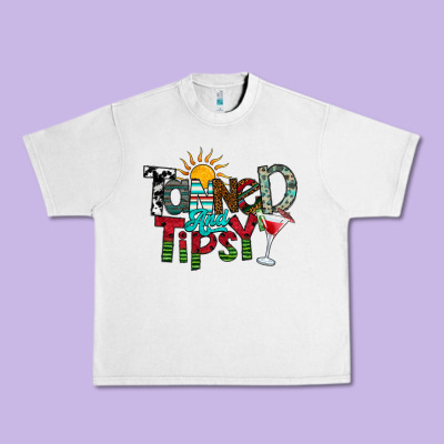 Tanned And Tipsy Urban Heavy Tee Designed By Cowhidedigitalart