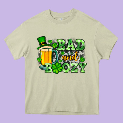 St. Patrick's Bad And Boozy Heavy Core Tee Designed By Oliviacreatesart
