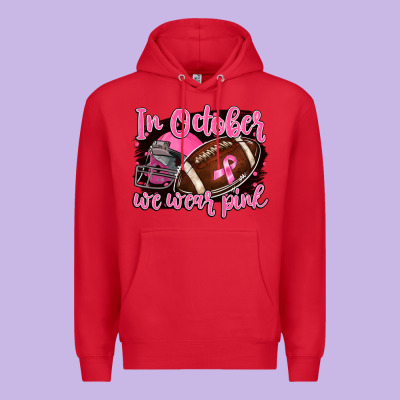 In October We Wear Pink With Football Premium Hoodie Designed By Barkaloodesign