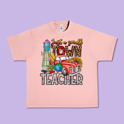 Just A Small Town Teacher Urban Heavy Tee Designed By Cowhidedigitalart