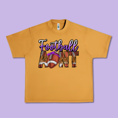 Football Aunt Urban Heavy Tee Designed By Cowhidedigitalart