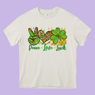 St. Patrick's Day Peace Love Luck Heavy Core Tee Designed By Oliviacreatesart