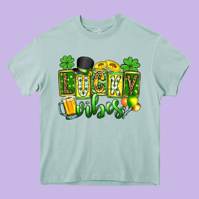 St. Patrick's Lucky Vibes Heavy Core Tee Designed By Oliviacreatesart