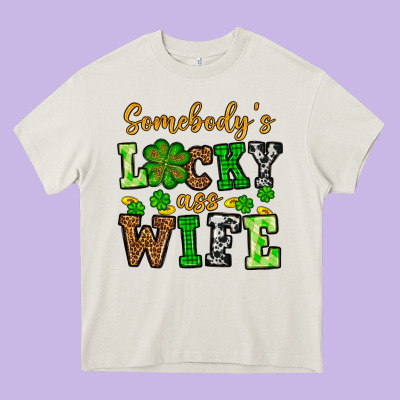 St. Patrick's Somebody’s Lucky Ass Wife Heavy Core Tee Designed By Oliviacreatesart