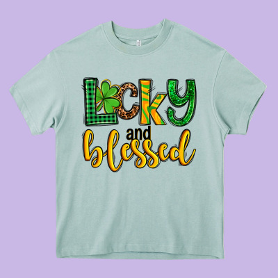 St. Patrick's Lucky And Blessed Heavy Core Tee Designed By Oliviacreatesart