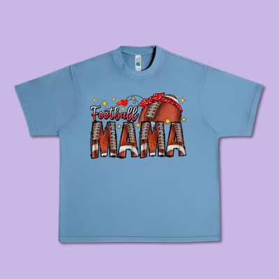 Football Mama Urban Heavy Tee Designed By Cowhidedigitalart