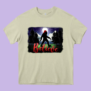 Bigfoot Believe Christmas Heavy Core Tee Designed By Fadigitalartstudio