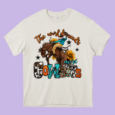 The World Needs More Cowboys Heavy Core Tee Designed By Oliviacreatesart