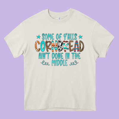 Some Of Y'alls Cornbread Ain't Done In The Middle Heavy Core Tee Designed By Cowcowdesign