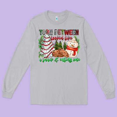 Torn Between Looking Like A Snack Eating One Long Sleeve Tee Designed By Cowhidedigitalart