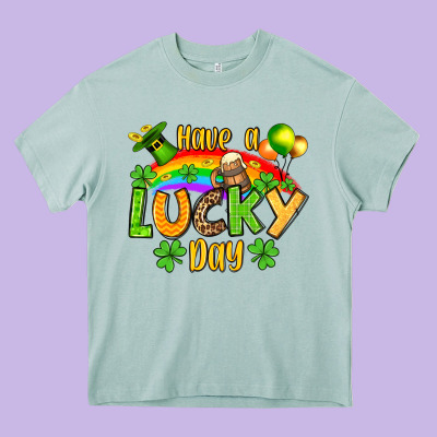 St. Patrick's Have A Lucky Day Heavy Core Tee Designed By Oliviacreatesart