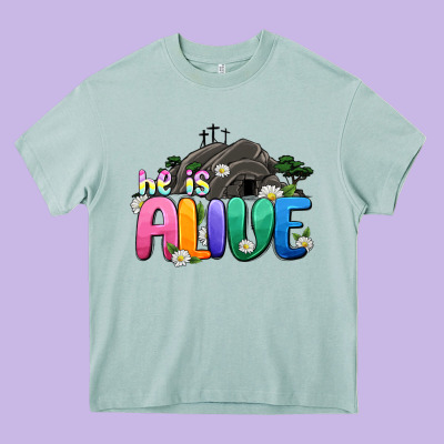 Easter Day He Is Alive Heavy Core Tee Designed By Oliviacreatesart