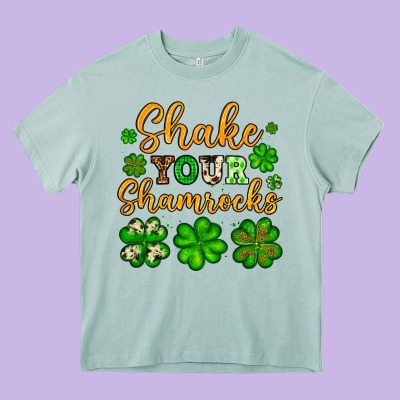 St. Patrick's Shake Your Shamrocks Heavy Core Tee Designed By Oliviacreatesart