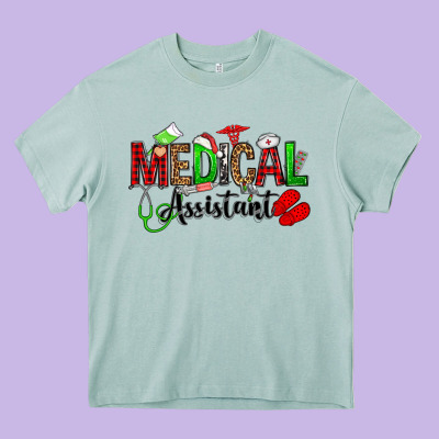 Medical Assistant Christmas Heavy Core Tee Designed By Oliviacreatesart