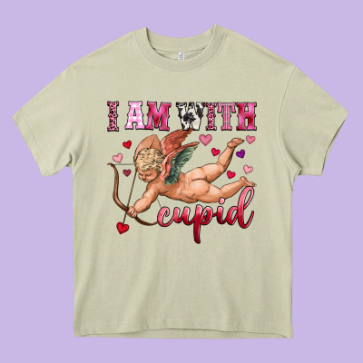 I Am With Cupid Heavy Core Tee Designed By Oliviacreatesart