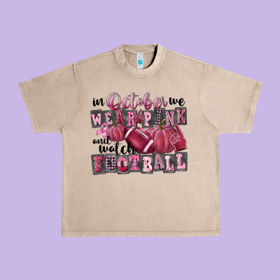 In October We Wear Pink And Watch Football Urban Heavy Tee Designed By Fadigitalartstudio