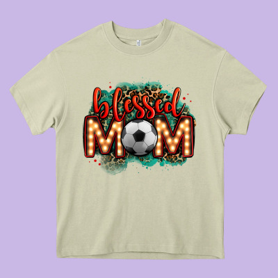 Blessed Soccer Mom Lightbulb Letters Heavy Core Tee Designed By Oliviacreatesart