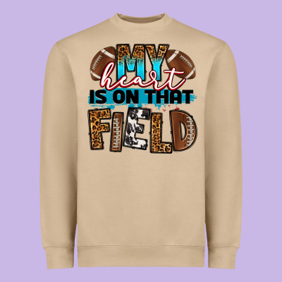 My Heart Is On That Field Football Heavyweight Sweatshirt Designed By Ranaportraitstore