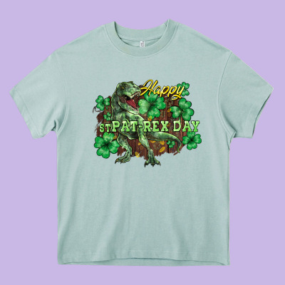 Happy St. Patrick's Day T-rex Heavy Core Tee Designed By Howdyjamesfarm
