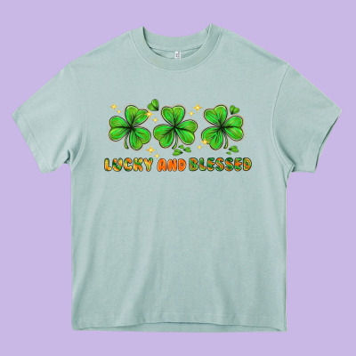 St. Patrick's Day Lucky And Blessed Heavy Core Tee Designed By Howdyjamesfarm
