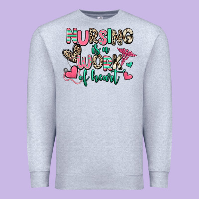 Nursing Is A Work Of Heart Premium Sweatshirt Designed By Ranaportraitstore