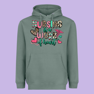 Nursing Is A Work Of Heart Heavyweight Hoodie Designed By Ranaportraitstore