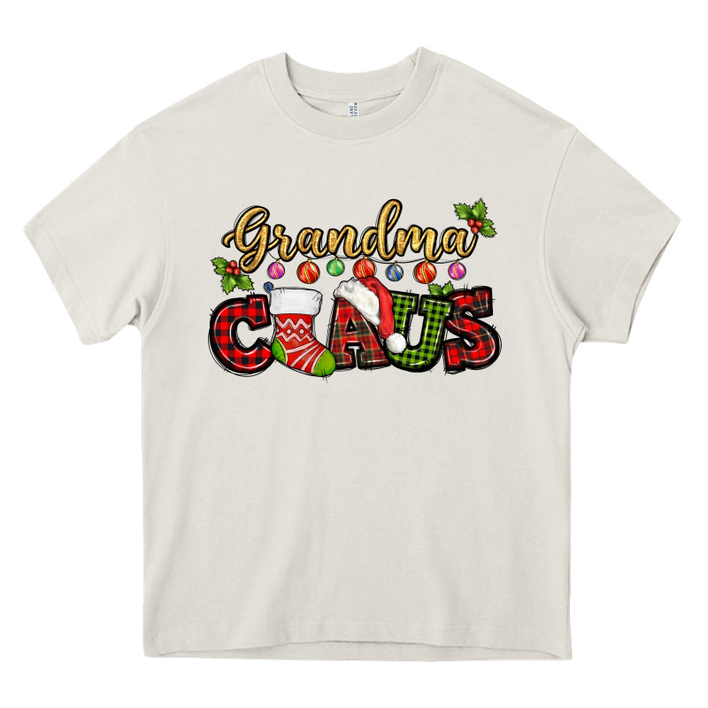 Grandma Claus With Christmas Gift Sock Mother's Heavy Core Tee by HowdyJamesFarm | Teevron