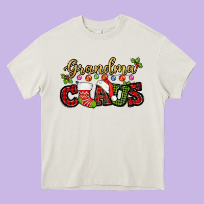 Grandma Claus With Christmas Gift Sock Mother's Heavy Core Tee Designed By Howdyjamesfarm